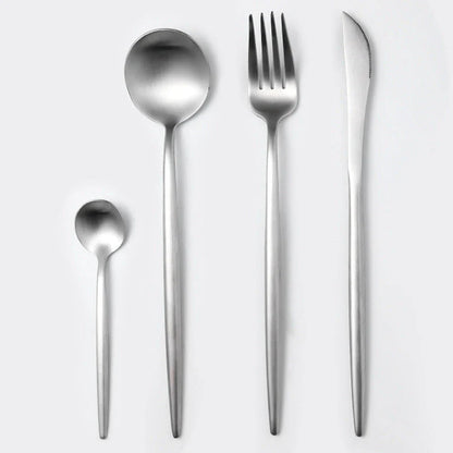 Premium stainless steel cutlery set with a mirror-polished finish, including coffee spoons, dessert spoons, main meal spoons, dessert forks, main forks, and chopsticks, presented in a stylish gift box.