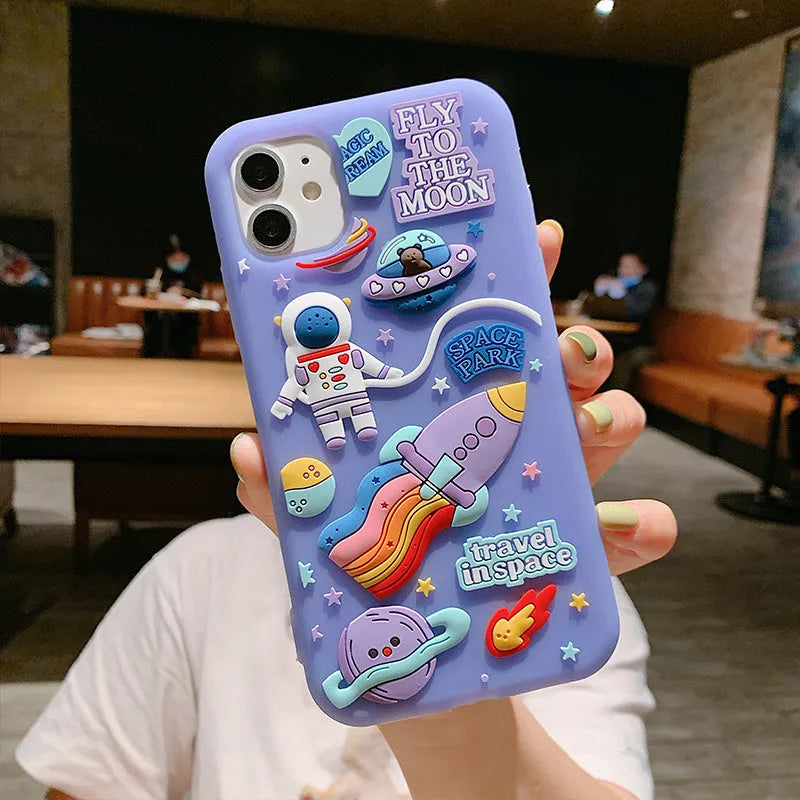 Purple translucent silicone iPhone case featuring a cartoon astronaut graphic.