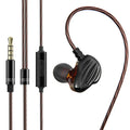 White in-ear sports headphones with black cable looped over the ear, showing the 3.5mm plug.