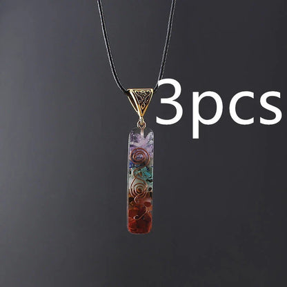 Chakra-inspired acrylic pendant with a unique geometric design and natural variations in the stone patterns