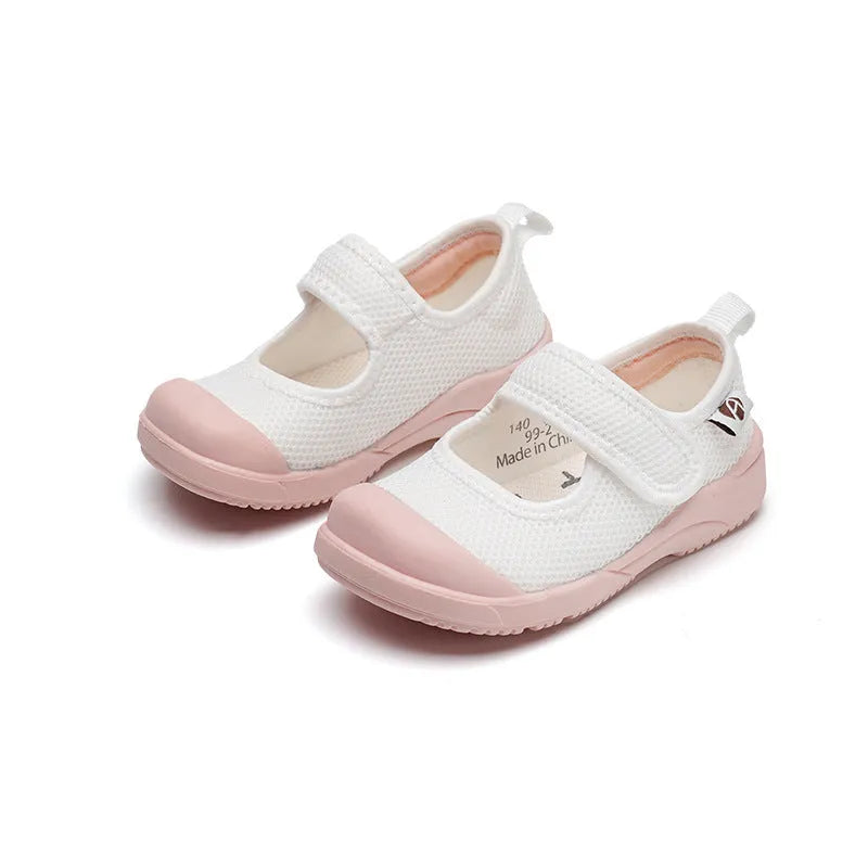 White children's cloth shoes with mesh upper and Velcro fastening