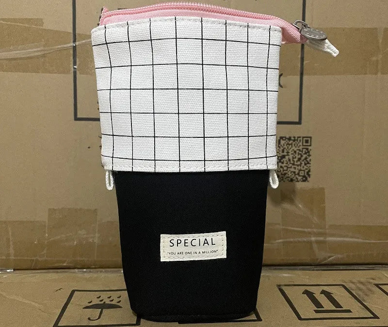 Canvas pencil bag with round Korean-style design in cartoon pattern colours