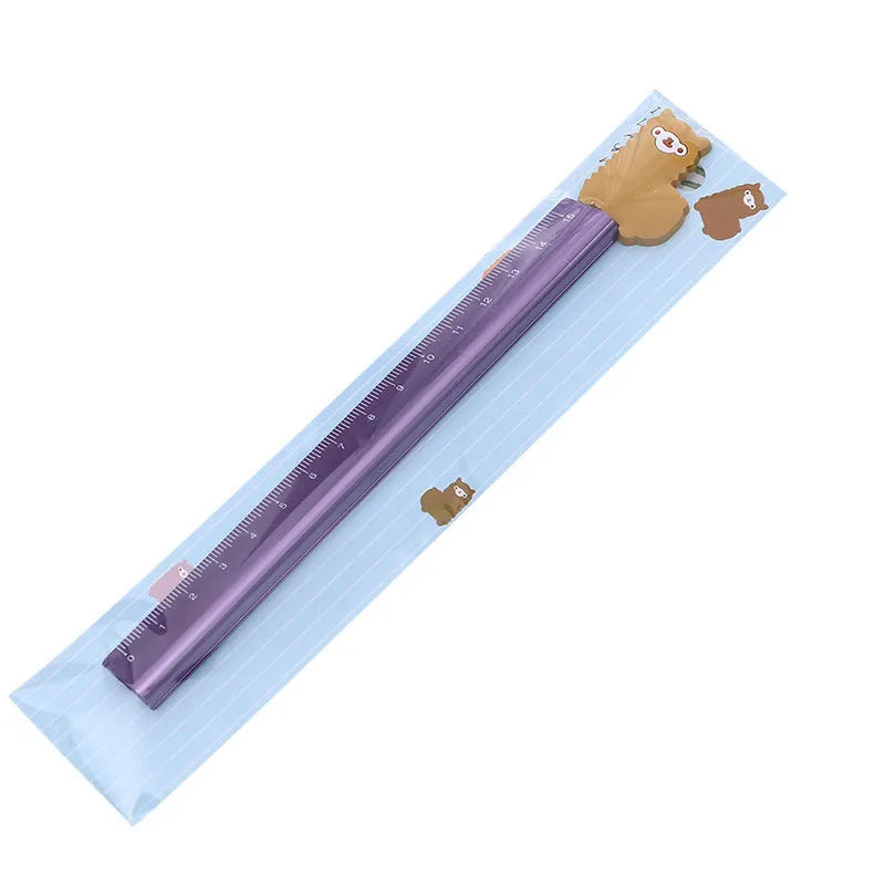 30cm aluminium ruler with centimetre and inch scales on a clear non-slip plastic backing.