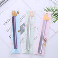 30cm aluminium ruler with centimetre and inch scales on a clear non-slip plastic backing.