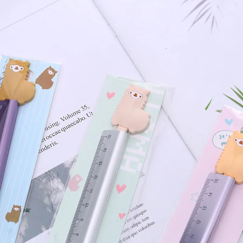 30cm aluminium ruler with centimetre and inch scales on a clear non-slip plastic backing.