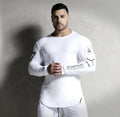 Men's long-sleeved compression base layer top, breathable elastic quick-drying wicking fitness training shirt, black or white, sizes M to 2XL.