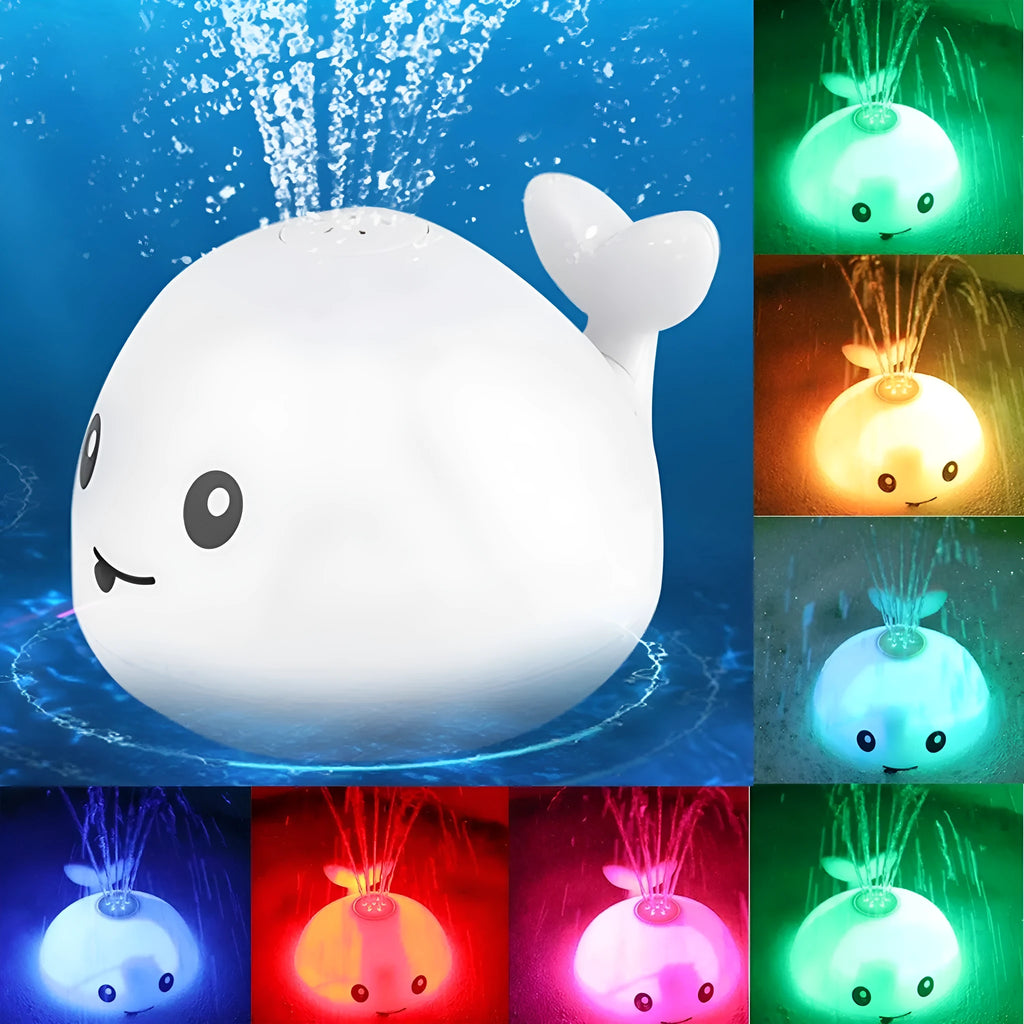 Grey and white whale bath toy spraying water with LED lights flashing