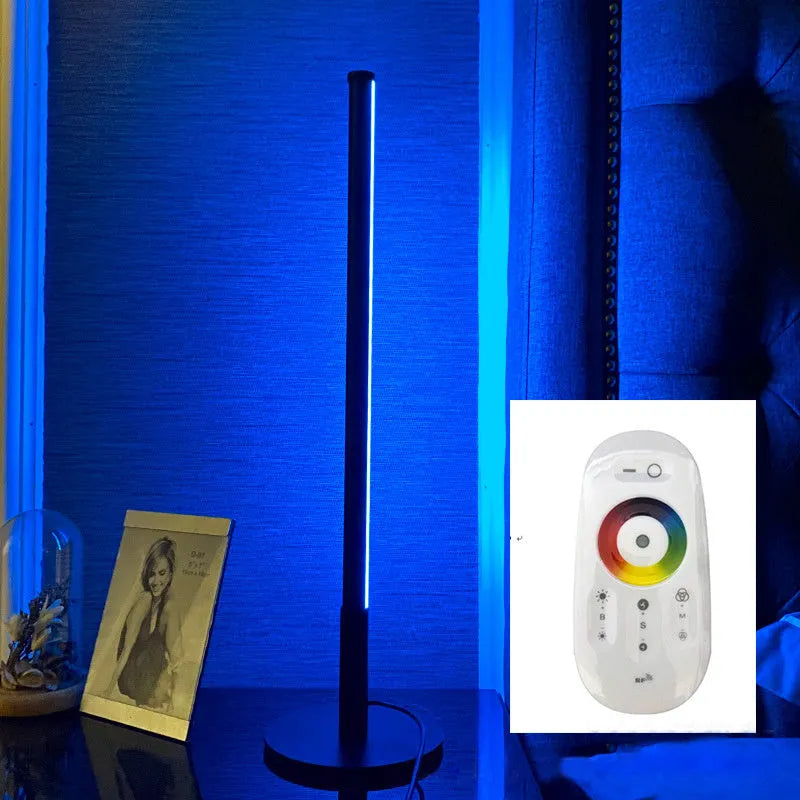 Nordic minimalism black bedside lamp with LED lighting and remote control on table