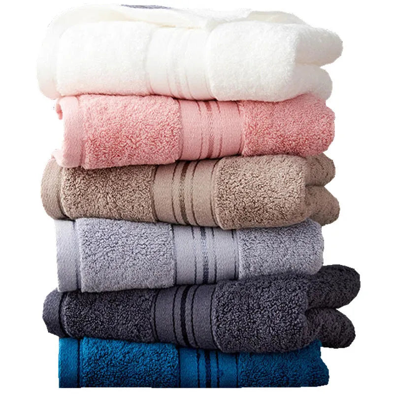 Pure cotton three-piece towel set showing bath towel, hand towel and square scarf in a blue colour.