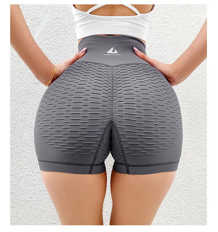 High-waisted jacquard peach hip yoga three-quarter shorts in Black, with quick-drying Lycra lining, size S/M.