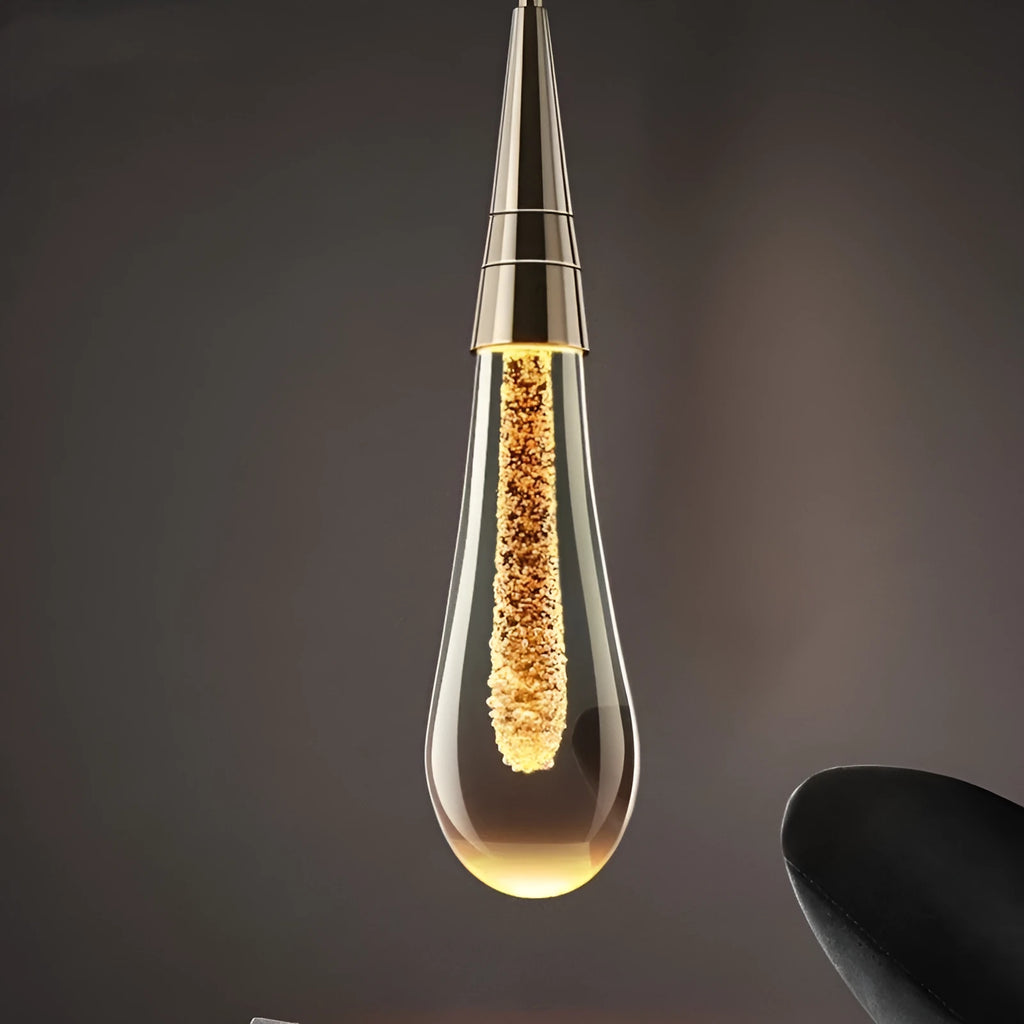 Single head crystal LED chandelier with adjustable cord showing postmodern design and warm white illumination