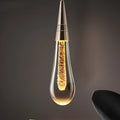 Single head crystal LED chandelier with adjustable cord showing postmodern design and warm white illumination