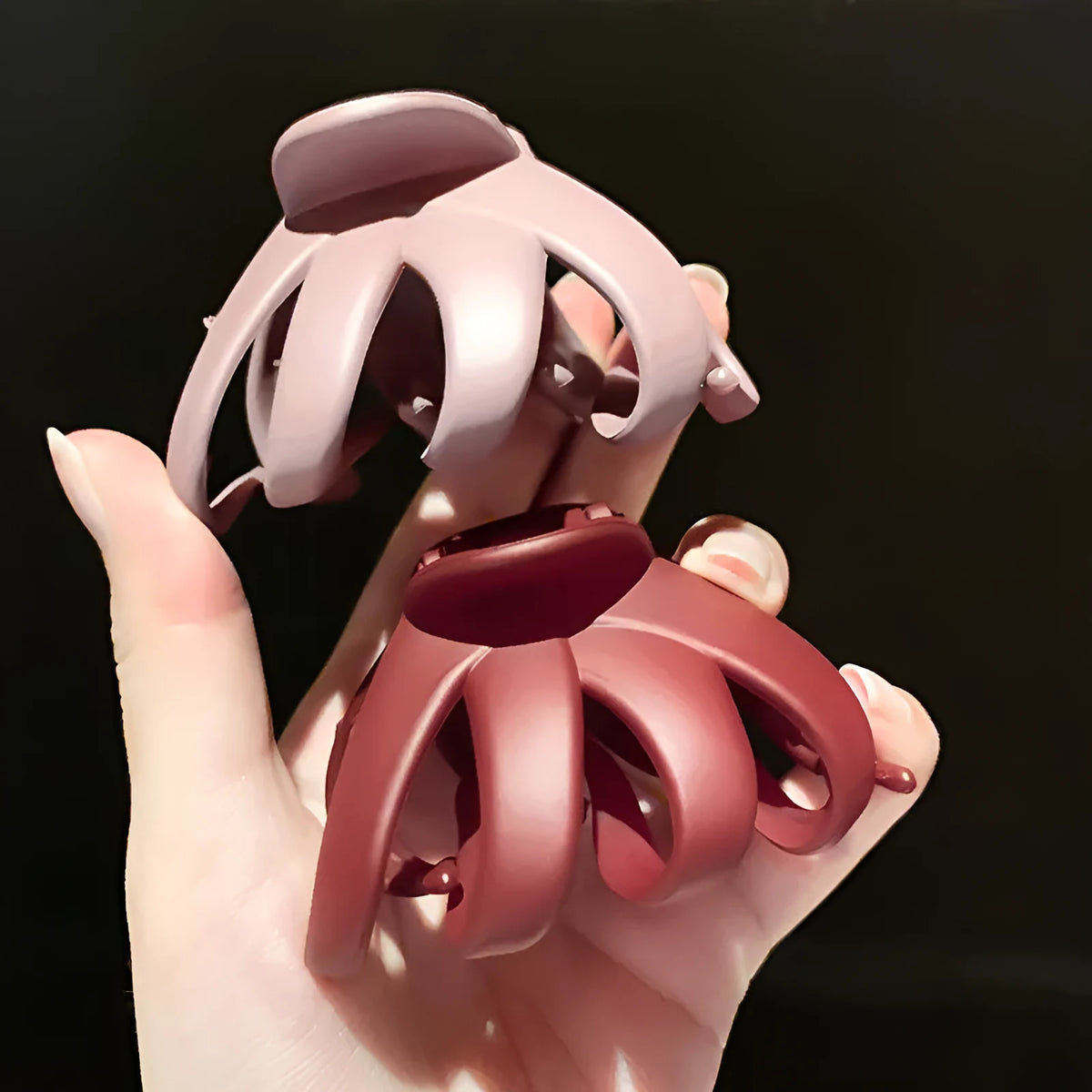 Children's hair clips in small and large sizes, shown in six colours including green, dark blue, wine red, black, dark pink, and blue grey.