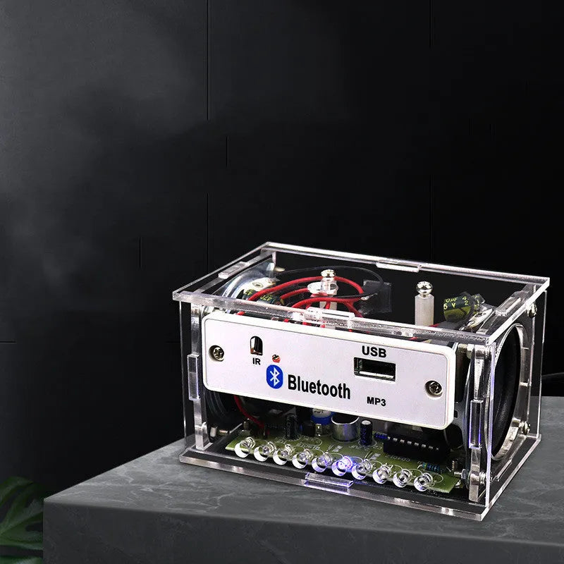 Bluetooth speaker DIY kit with transparent acrylic shell and electronic components for assembly