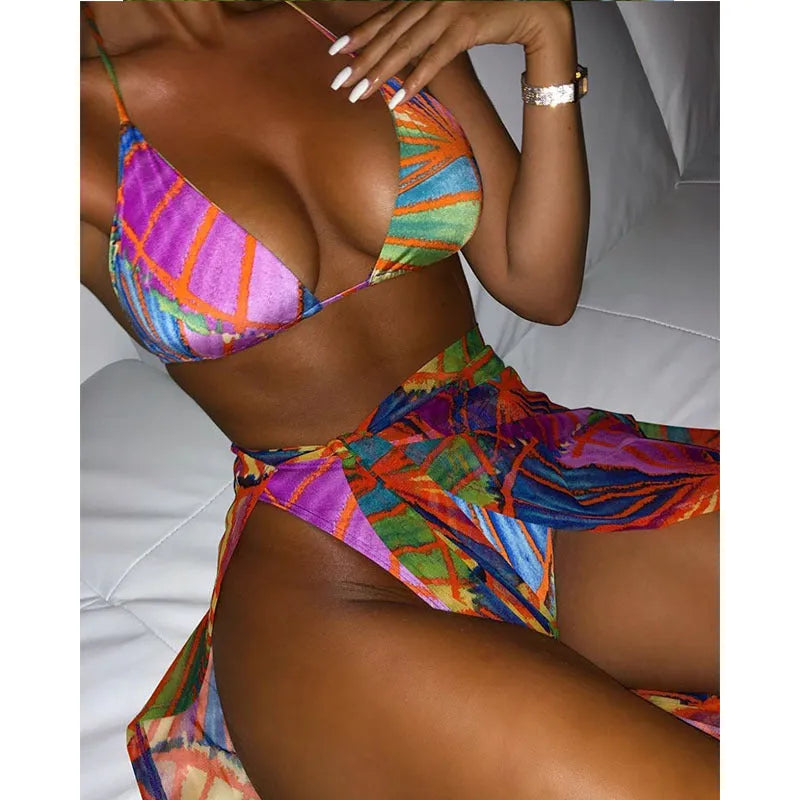 Women's sandy colour three-piece bikini set with top, bottom, and sheer veil cover-up