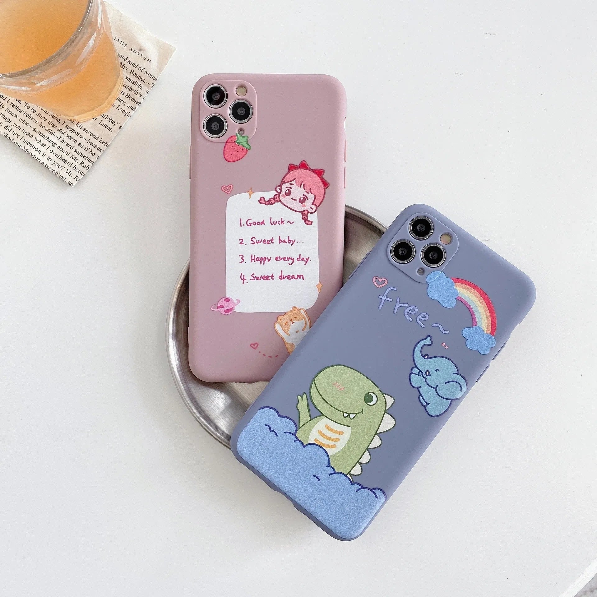Blue frosted TPU iPhone case with a cartoon dinosaur print on the back.