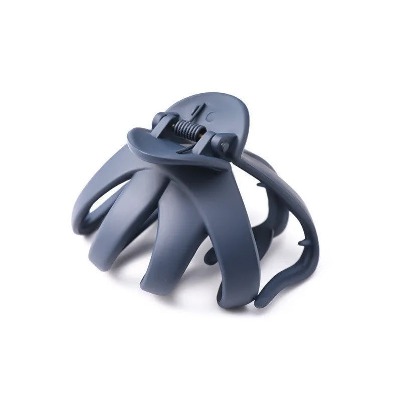 Children's hair clips in small and large sizes, shown in six colours including green, dark blue, wine red, black, dark pink, and blue grey.