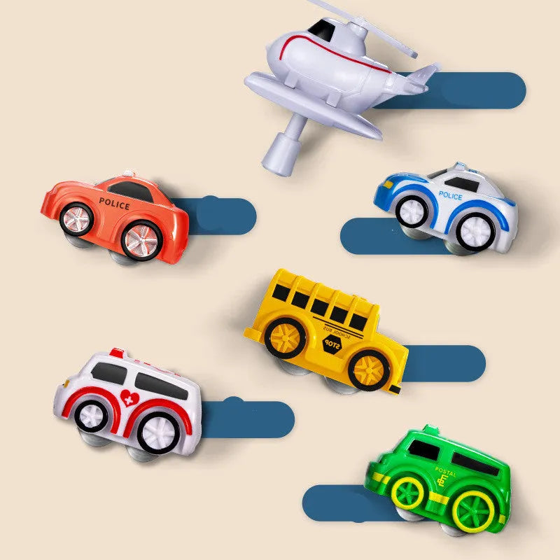 Children's plastic parking lot toy track with crane, conveyor belt, and included vehicles