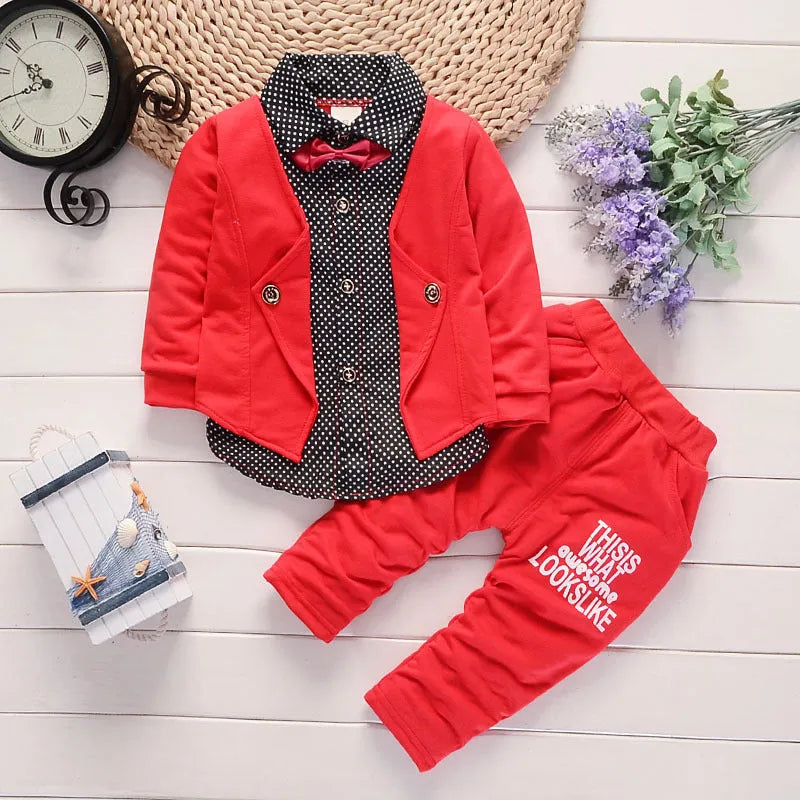 Toddler boy in a casual printed suit set, available in grey, navy blue, or red.