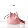 Leopard print PU bucket bag for women with rivet detail, python pattern strap, and magnetic buckle