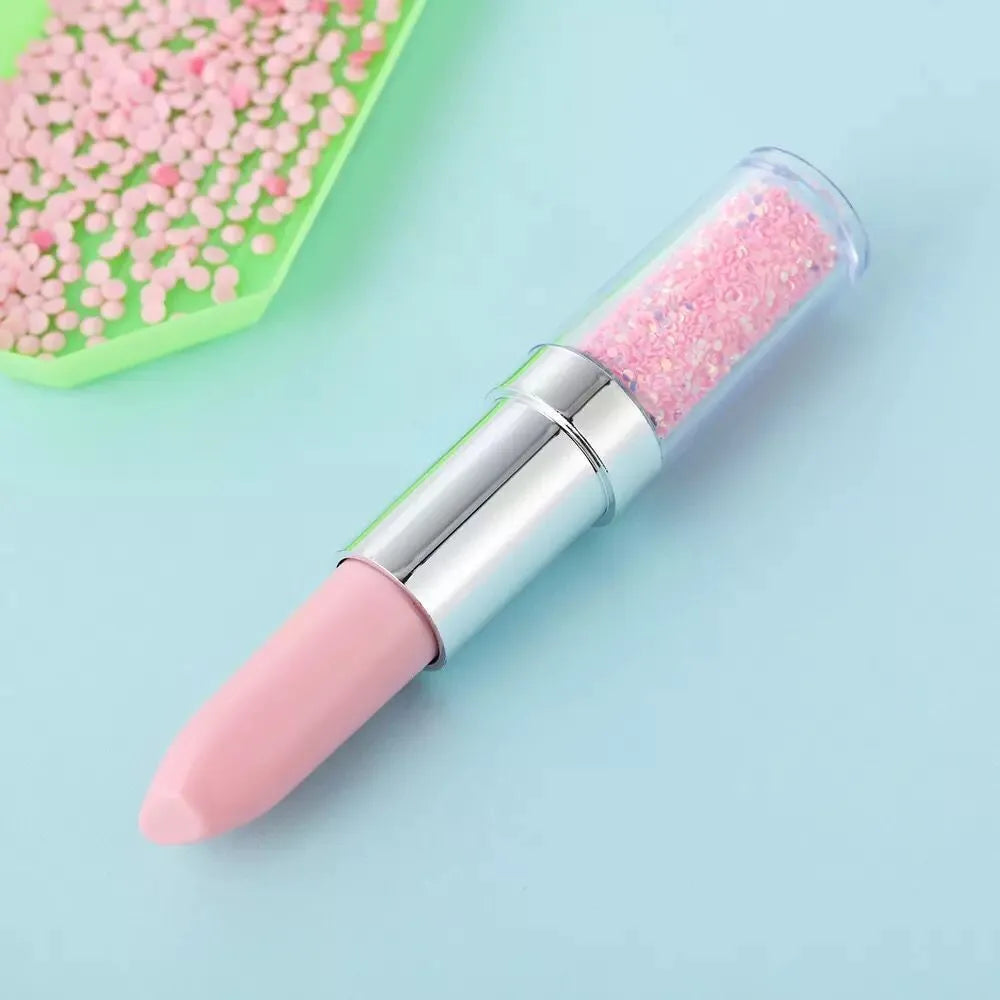 A plastic diamond painting point drill pen for manual diamond placement, shown in pink, purple, and green colour options.
