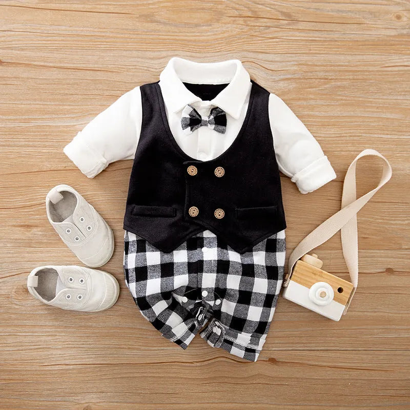 Baby boy in a cotton long-sleeved jumpsuit, navy blue gentleman style, for spring or autumn.