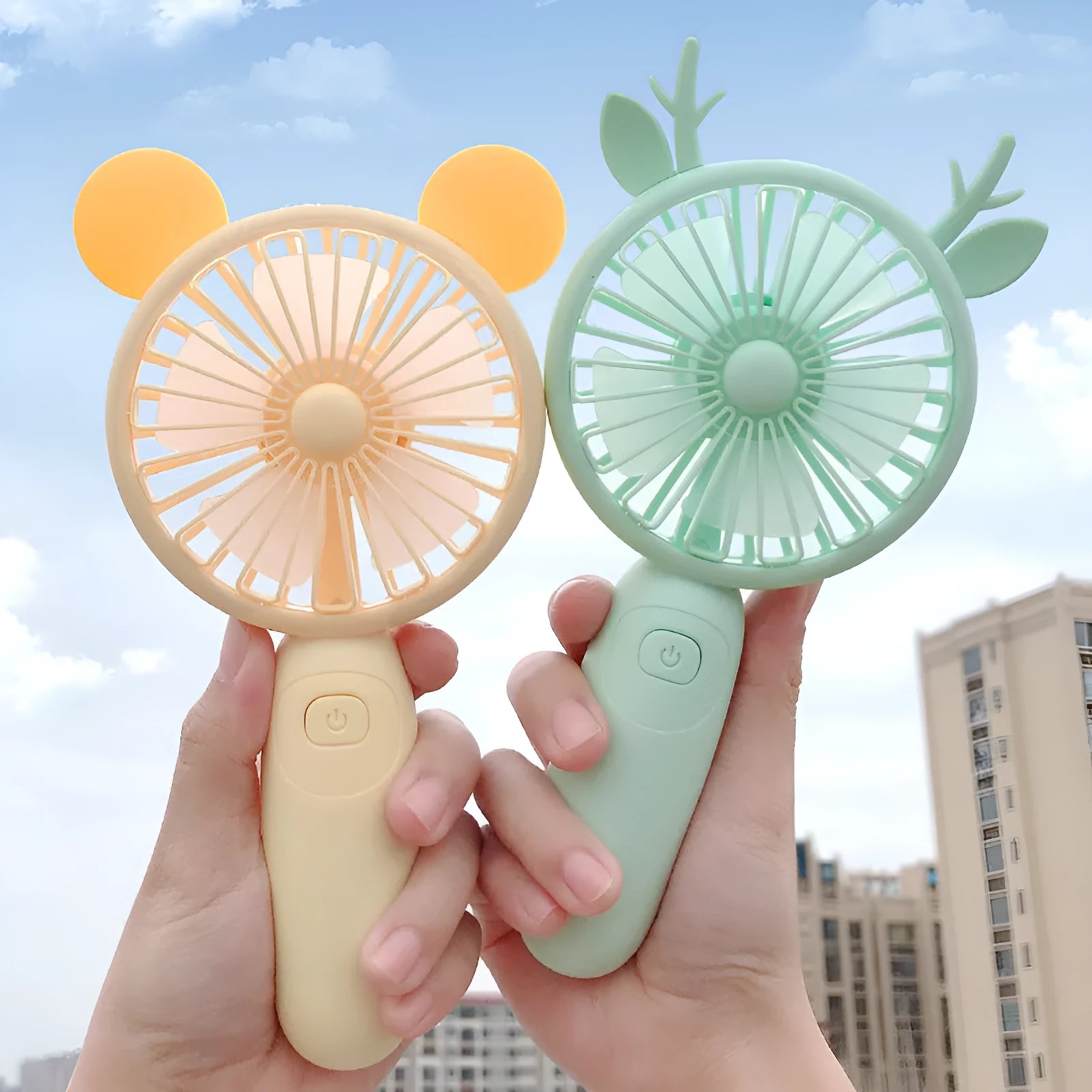 Handheld mini USB charging fan in cartoon style with plastic blades