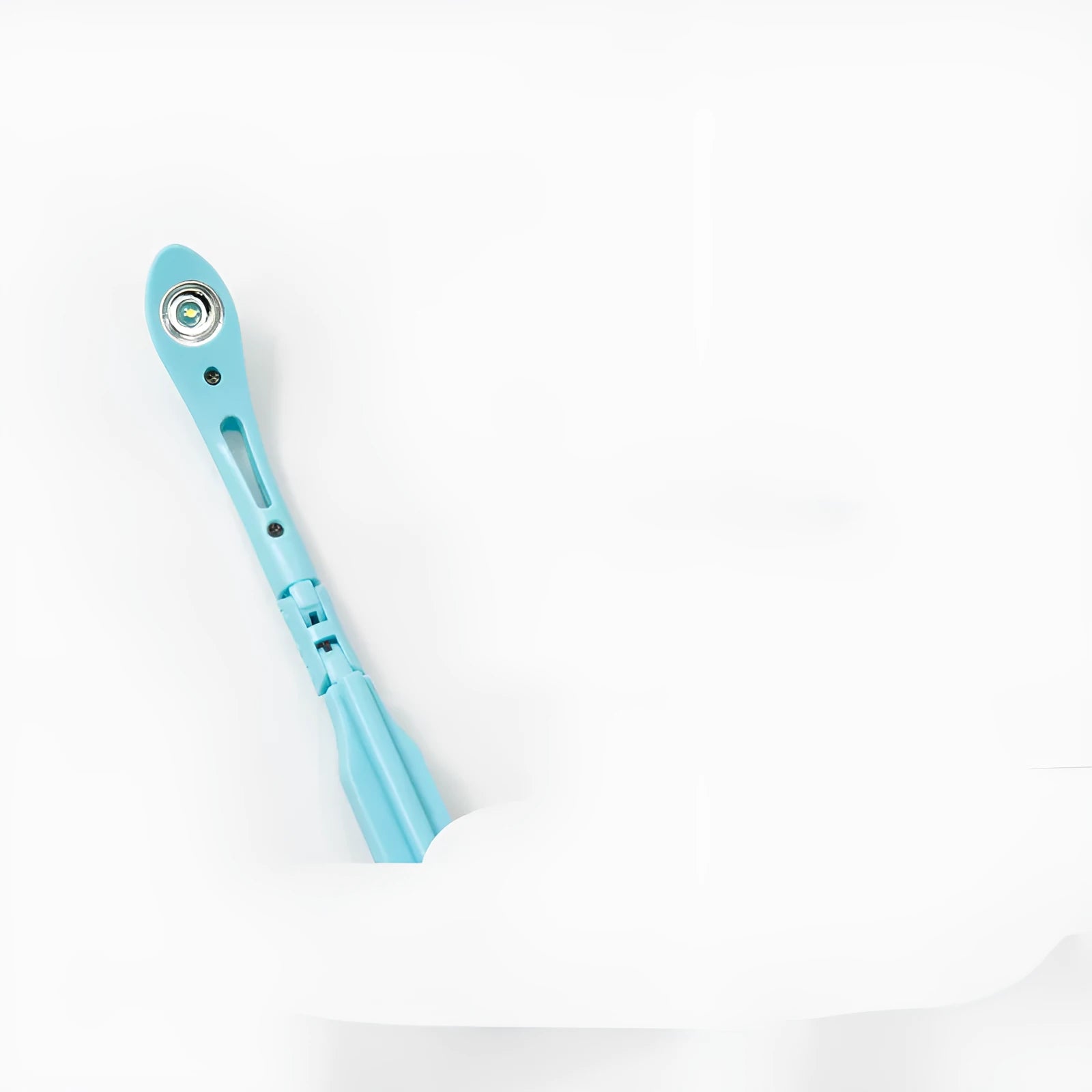 Folding battery-powered book light in blue colour, shown open and closed.