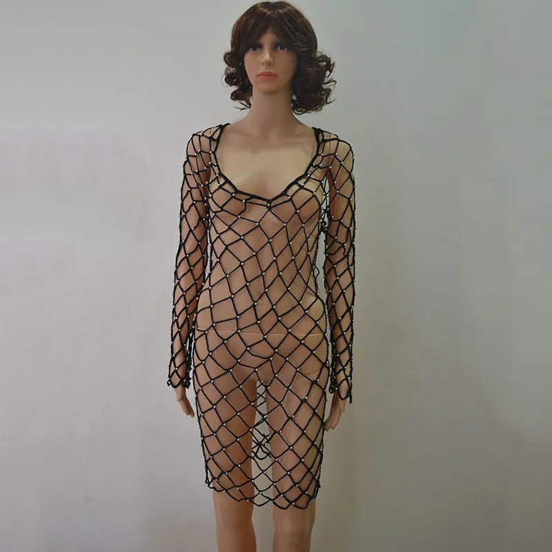 Sling swimsuit cover-up with round neck and straight cut in white or black, sizes S to XL