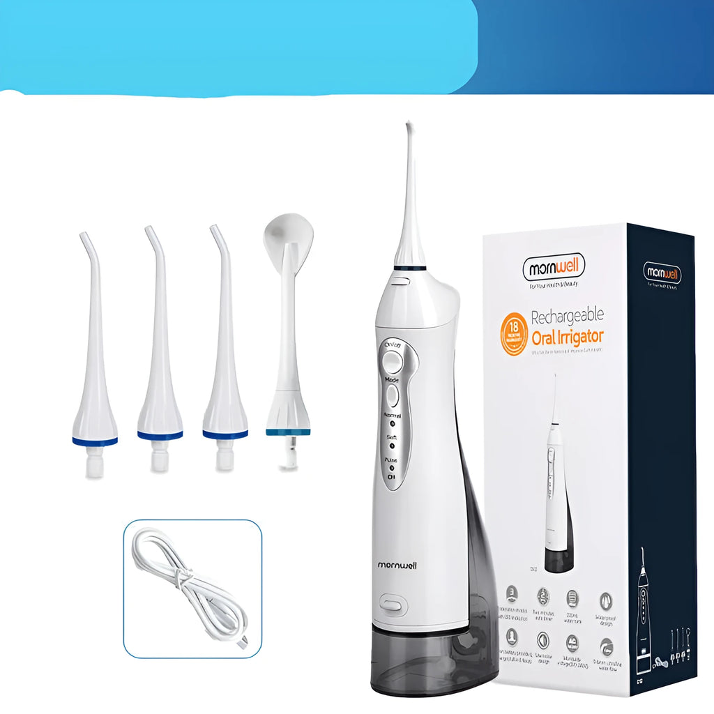 White portable oral irrigator water flosser with 330ml tank, 4 nozzles, and USB charging cable on a bathroom counter.