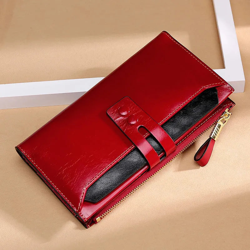 Retro women's leather wallet with multiple card slots and buckle closure in various colour options