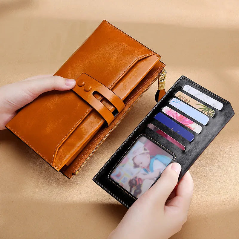 Retro women's leather wallet with multiple card slots and buckle closure in various colour options