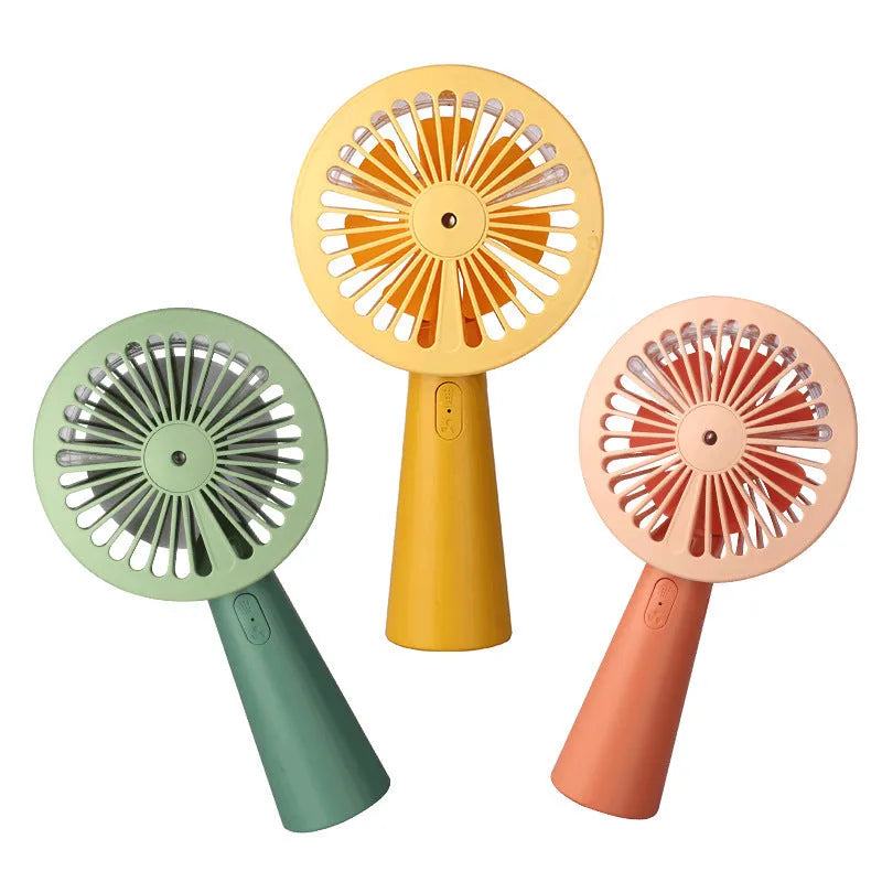 Nano spray fan handheld USB mini portable mist fan in green with plastic body and spray nozzle