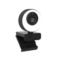 Black USB webcam with magnetic privacy cover on a laptop, showing 1080p resolution and built-in microphone