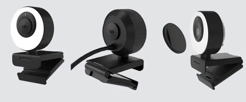 Black USB webcam with magnetic privacy cover on a laptop, showing 1080p resolution and built-in microphone