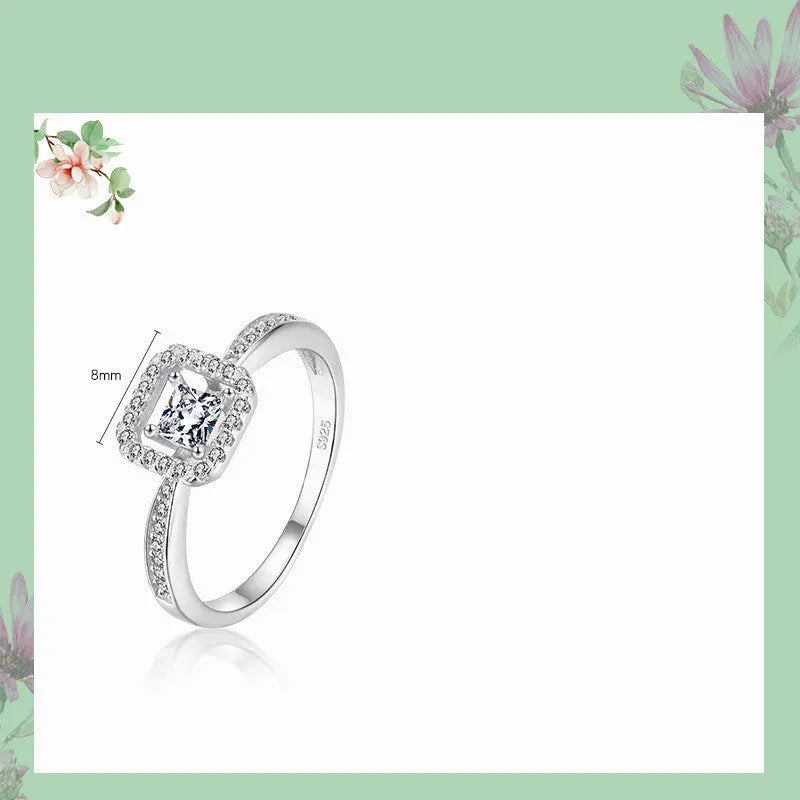 Square hollow 925 sterling silver ring with synthetic zirconia inlay on silver background