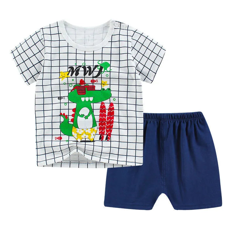 Cotton short sleeve top and shorts set for babies with cartoon elephant print.