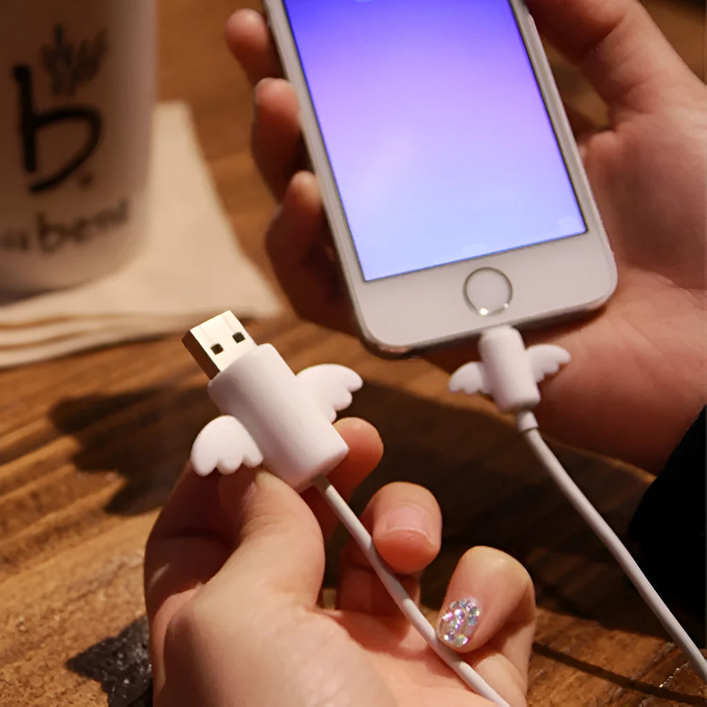 White Angel and black Bat design silicone protective covers for mobile phone charging cables in two sizes.
