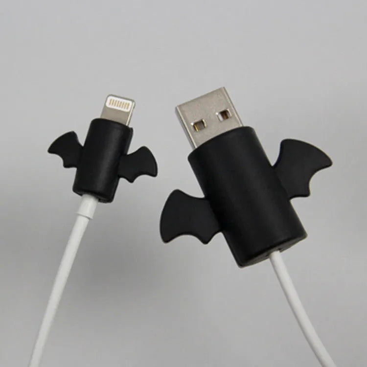 White Angel and black Bat design silicone protective covers for mobile phone charging cables in two sizes.