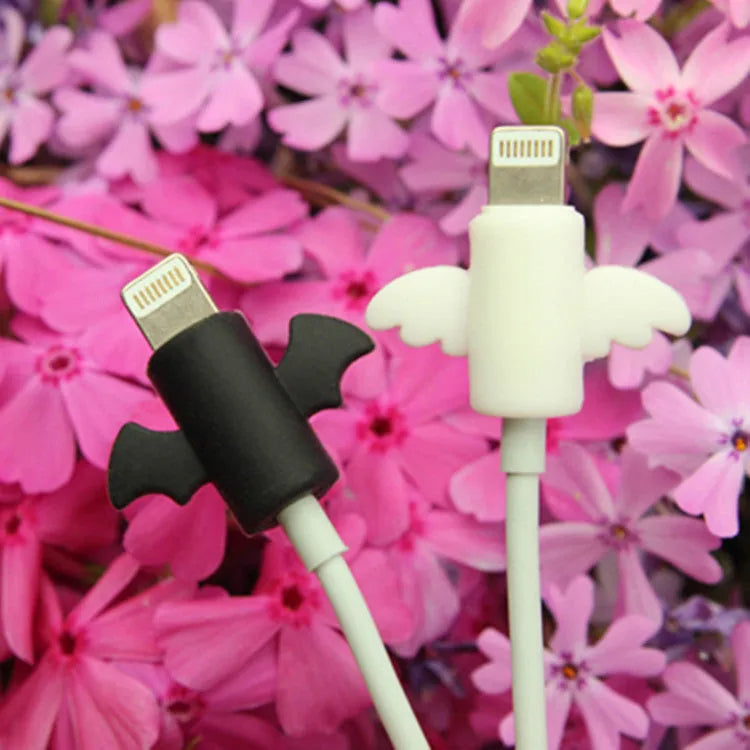 White Angel and black Bat design silicone protective covers for mobile phone charging cables in two sizes.