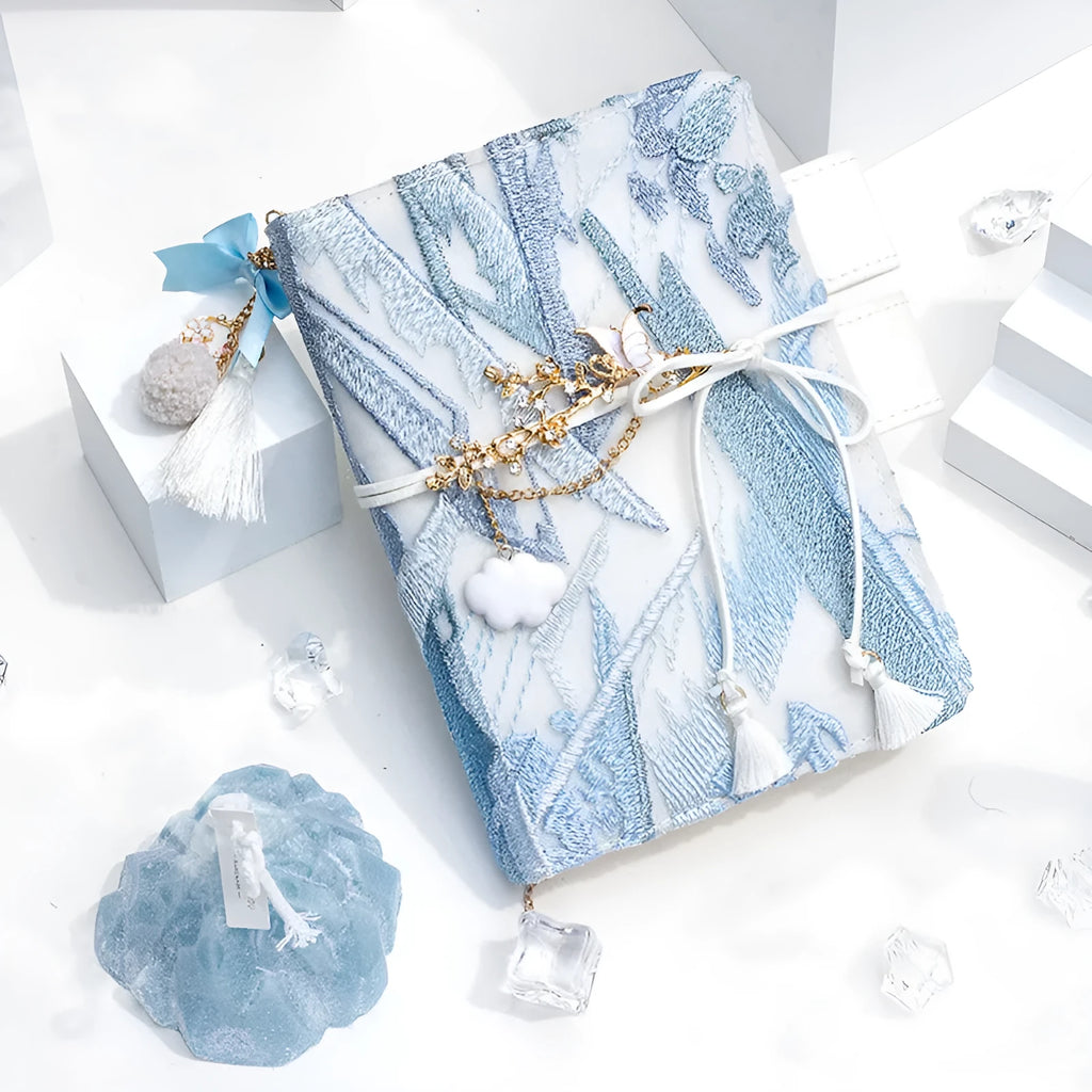 Glacier embroidery pattern fabric notebook with grid pages in A6 and A5 sizes.