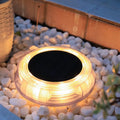 8 LED solar outdoor lawn lamp with IP67 waterproof housing and 1800mAh battery on a garden path