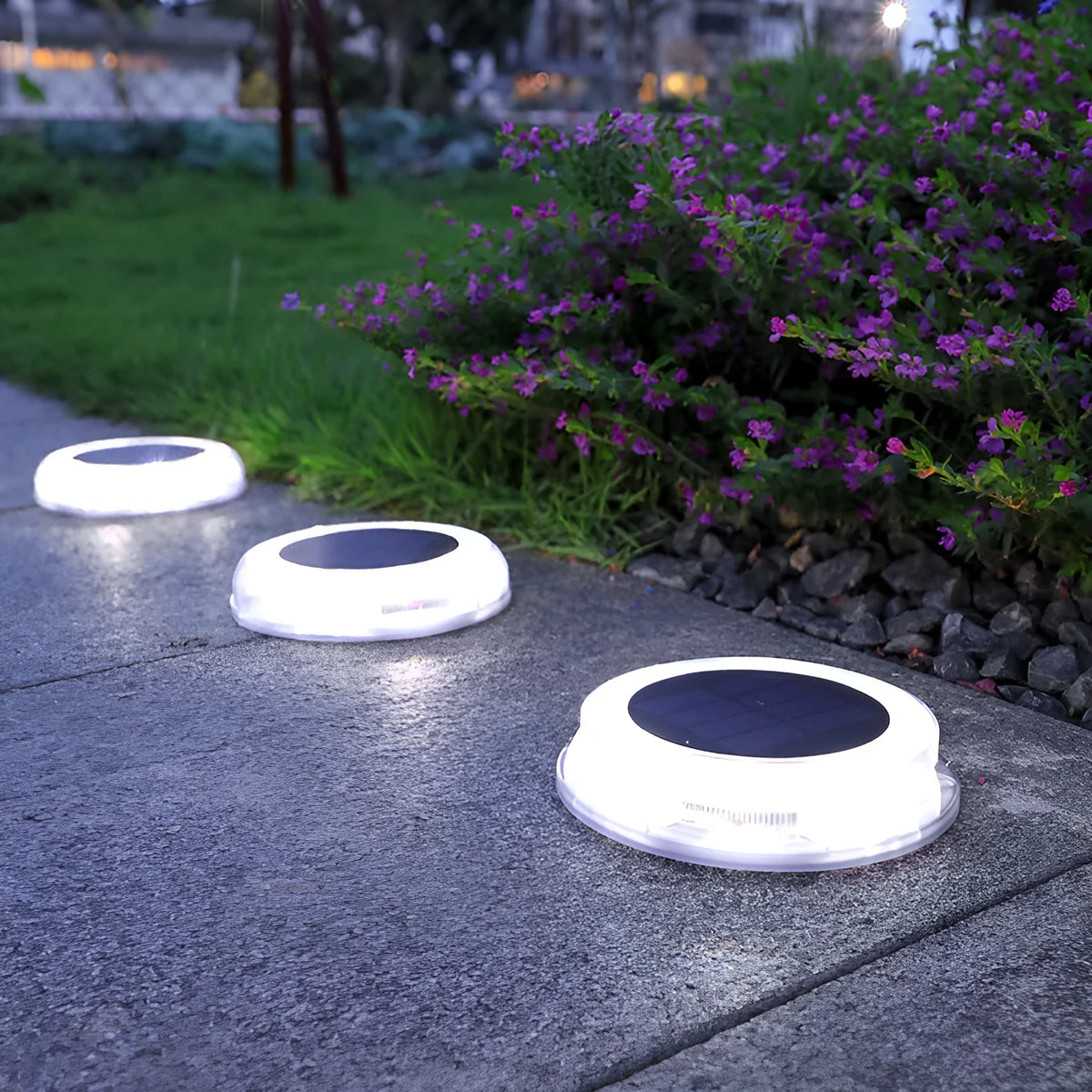 8 LED solar outdoor lawn lamp with IP67 waterproof housing and 1800mAh battery on a garden path
