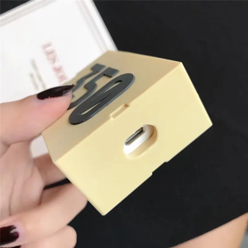 Silicone protective sleeve for Apple AirPods with attached carabiner clip in solid colour