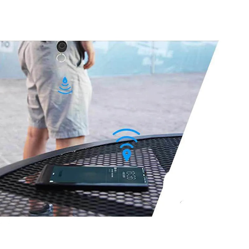 Black Bluetooth anti-lost tracker keychain with metal loop and selfie remote function
