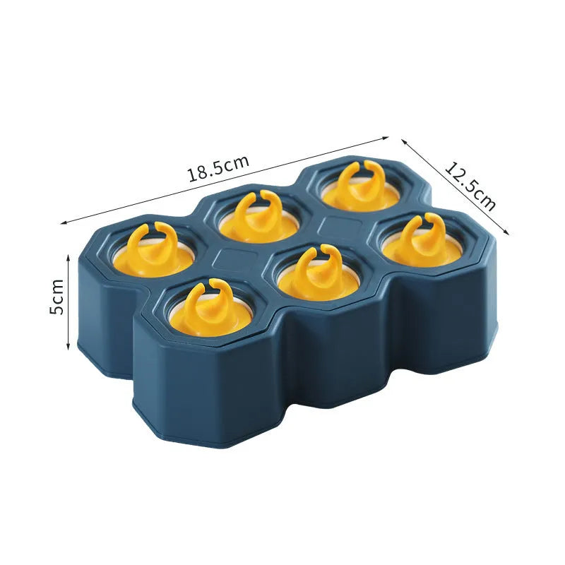 Brown plastic ice cube mold with honeycomb design and anti-drip edges