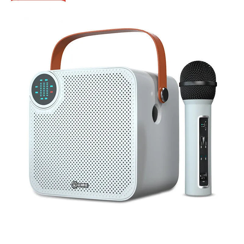Dynamic karaoke microphone with built-in speaker and display, wired USB, in black or white.
