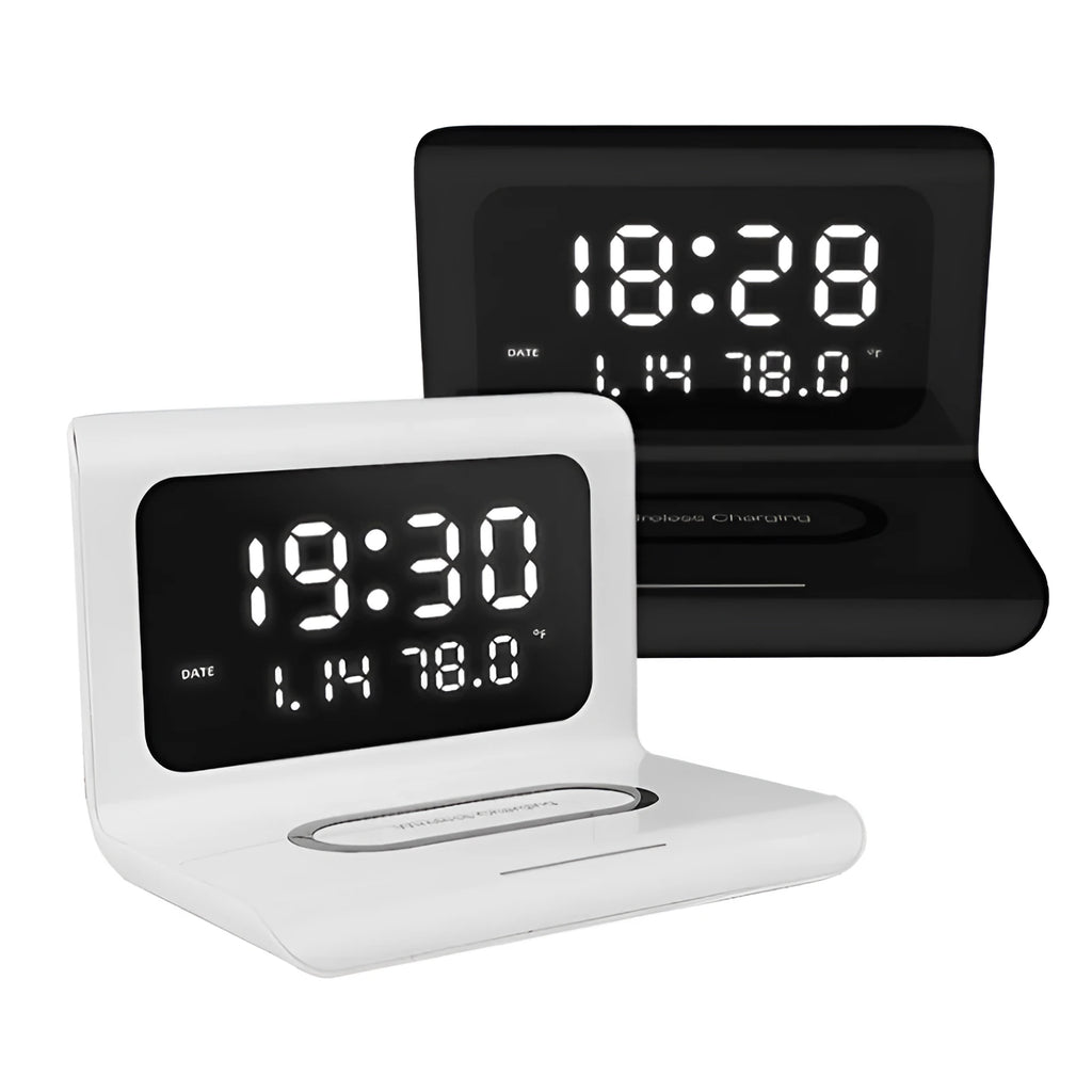 White wireless charger alarm clock showing digital time, date, temperature and humidity display on a desk.