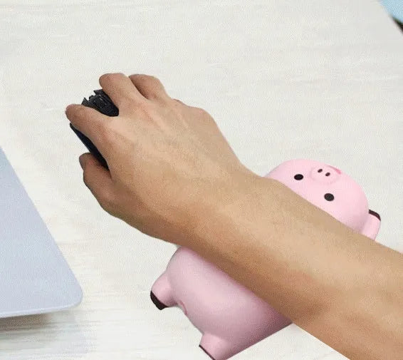 Black PU wristband mouse pad with integrated hand rest and wrist guard on a wooden desk