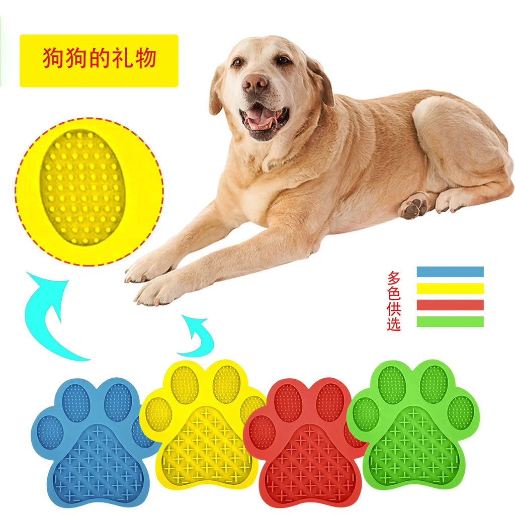 Paw-shaped silicone dog lick pad, 18cm x 18cm, food-grade BPA-free, shown in red with soft food spread on top